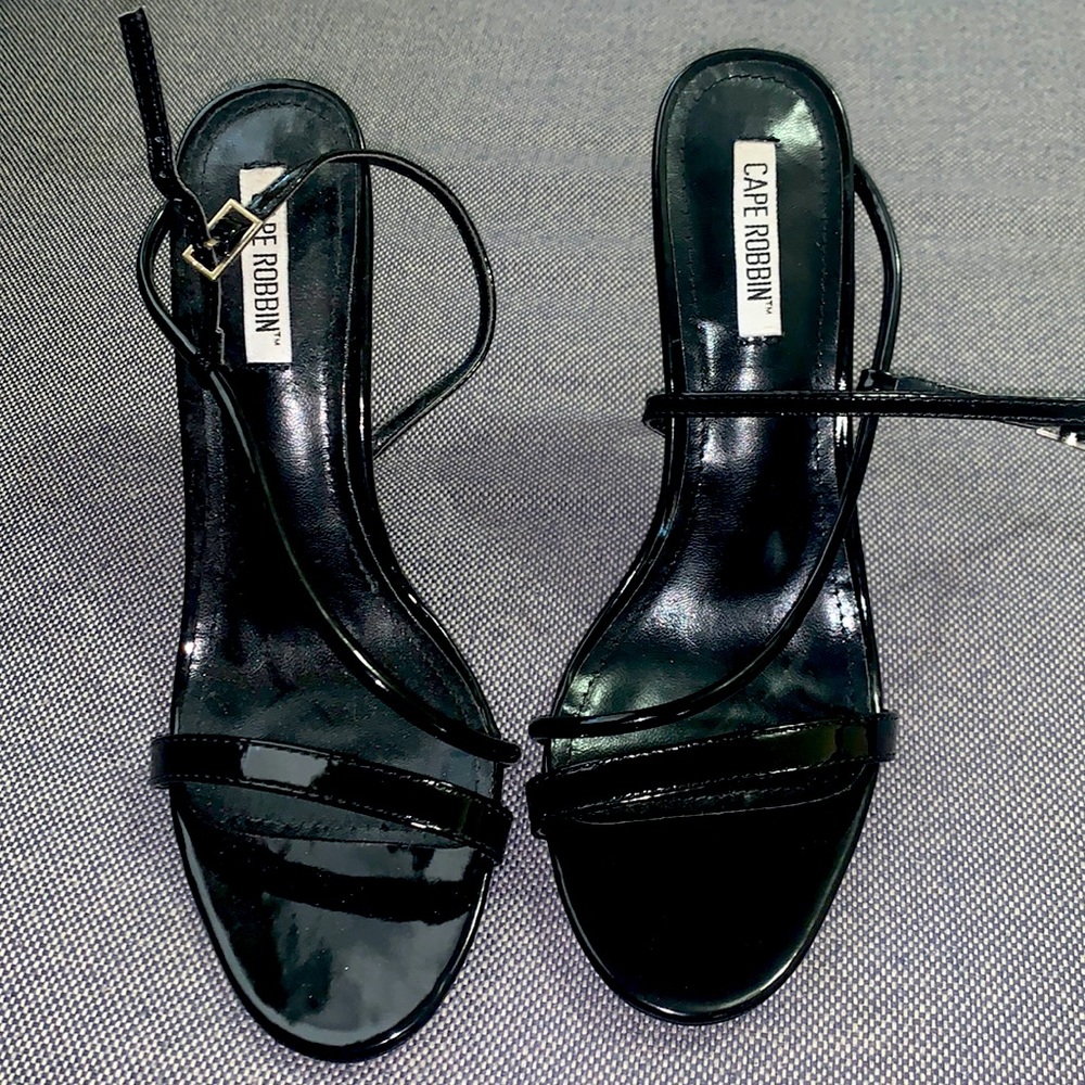 Brand new never worn Black heels size 9 woman